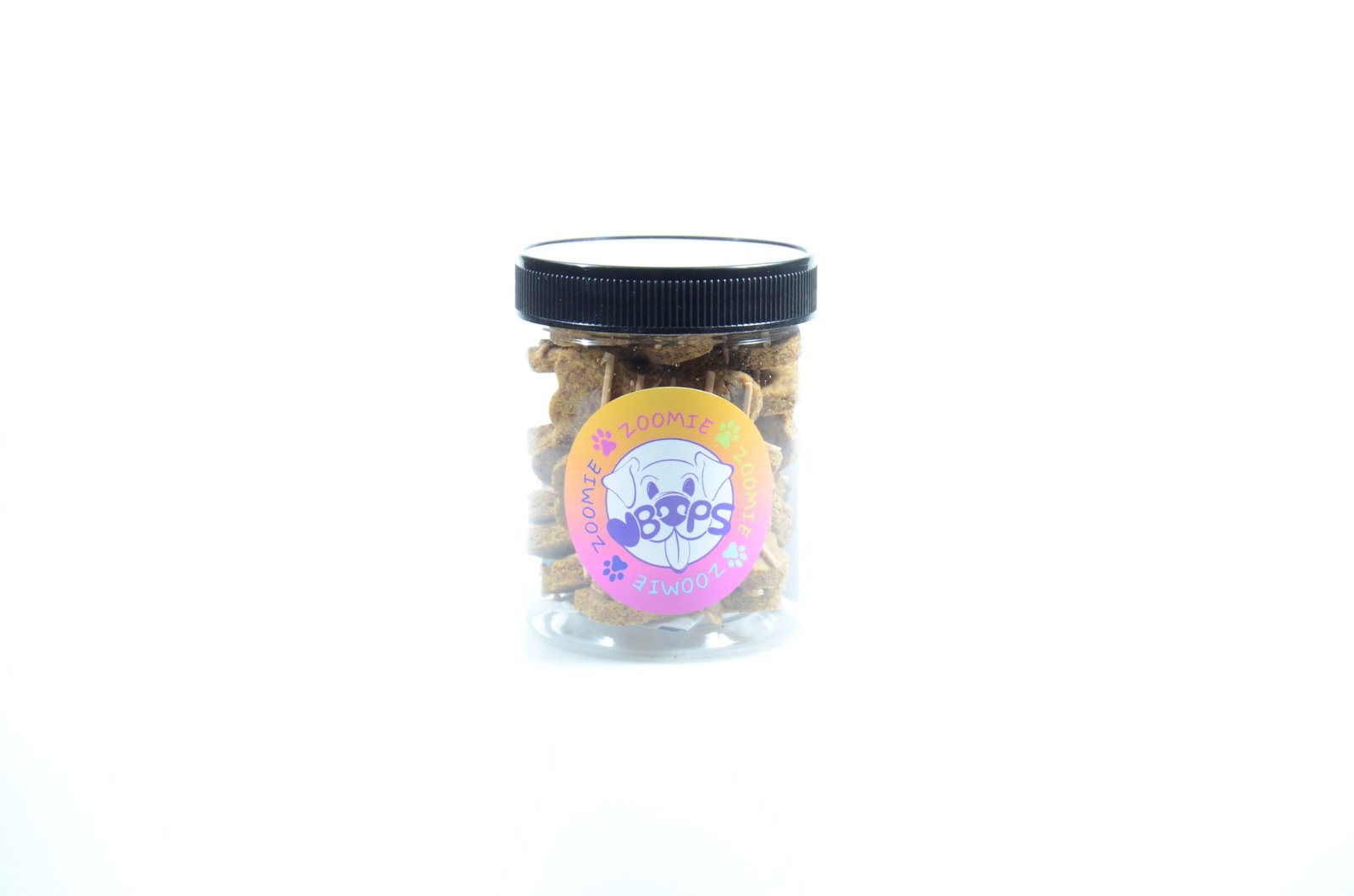 Jar of Zoomie Boops dog treats with a yellow and pink label